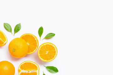 Fresh orange citrus fruit with leaves isolated on white background.