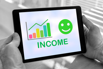 Income growth concept on a tablet