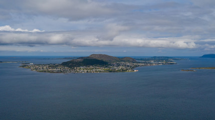 Valdero is a small island in Giske Municipality in More og Romsdal county, near Alesund, Norway. Panoramic aerial view, drone shot. July 2019