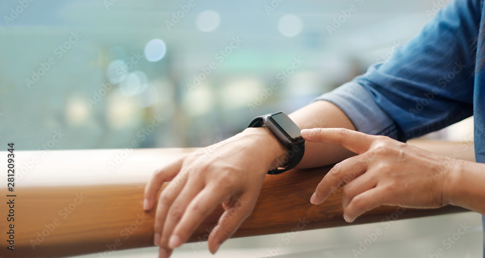 Poster a man using his smart watch app, communication, innovation and technology, business and network conn