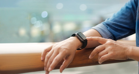A man using his smart watch app, communication,  innovation and technology, business and network connection.
