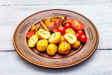 Roast chicken thighs and baby potatoes