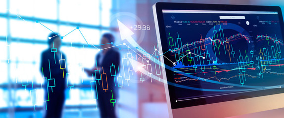 Financial data on screen. Abstract business. Investing and stock market gain and profits with graph charts, diagrams, growth, financial figures and investor business on background.