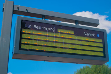 Information panel with Dutch bus departure