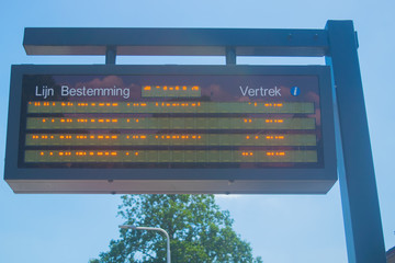 Information panel with Dutch bus departure
