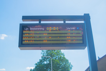 Information panel with Dutch bus departure