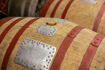 Close up of a wood barrel.