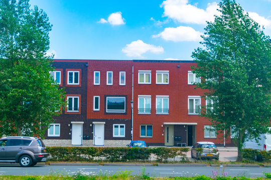 Lent Nijmegen, The Netherlands 28 July 2019, Houses in front of a road in Lent