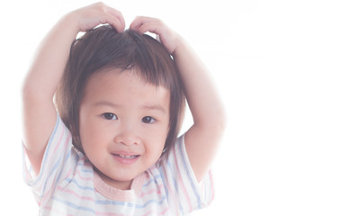 Happy asian kid girl on white background.