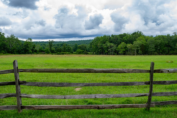 Fototapeta na wymiar Rail Fence at the Pasture