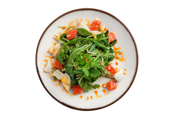 Salad with salmon, egg, cheese and arugula isolated on white