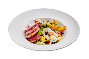 Grilled tuna with potato, cabbage, green beans and poached egg isolated on white
