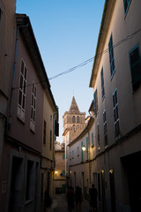 Vertical view of old medieval town of Sineu on a summe evening with bell tower in Palma de Mallorca balearic island