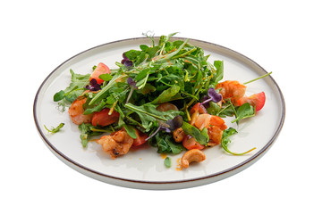 Salad with shrimps and fresh vegetables isolated on white