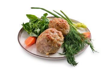 Fish cutlet served with fresh carrot, spring onion and parsey