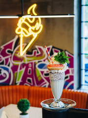 Monster freak shake with donut, mint and whipped cream