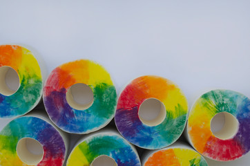 Multicoloured circles toilet paper white background 