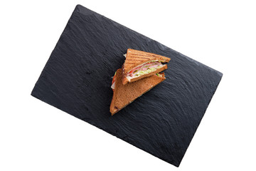 Club sandwich with roast beef, cheddar, cabbage and barbecue sauce isolated on white