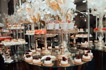 Candy bar. Wedding buffet. Cupcake. Food and drink. Sweet table for banquets, weddings, parties. 