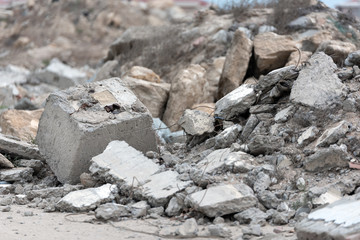 A pile of construction waste in a landfill. Selective focus