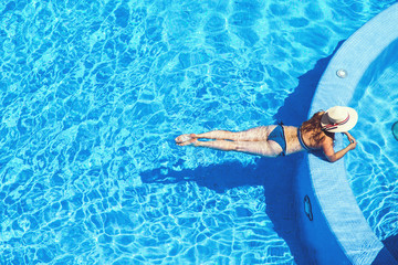 Woman in swimming pool. 