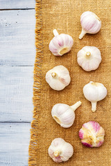 Fresh organic garlic on sackcloth