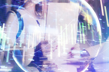 International business hologram over hands taking notes background. Concept of success. Multi exposure