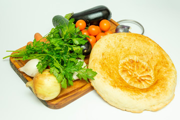 Traditional bread tortillas, pita bread, in eastern countries with vegetables