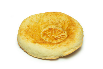 pita bread - a traditional oriental bread tortilla sprinkled with sesame seeds, on a white background