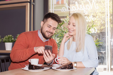 Couple relaxing in cafe