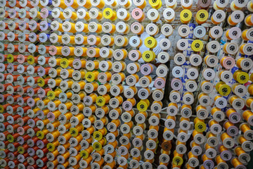 Colorful stringed cotton spools of thread for a loom, Varanasi, India