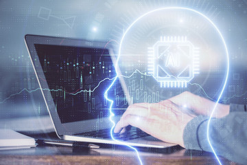 Man typing on keyboard background with brain hologram. Concept of big Data. Double exposure.