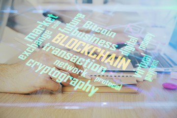 Blockchain theme hud with businessman working on computer on background. Concept of crypto chain. Double exposure.
