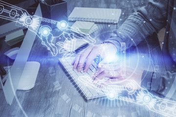 Double exposure of tech drawings with hands working on computer background. Concept of innovation.