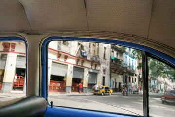 Havana streets from inside of a classic car in Cuba