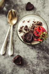 Dessert Vanilla panna cotta with fresh berries on gray background,.Top view. Holiday and comfort food concept. Close-up.