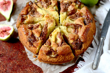 Fig cake on wooden table. Selective focus