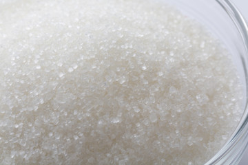 Closeup of sugar in glass bowl 