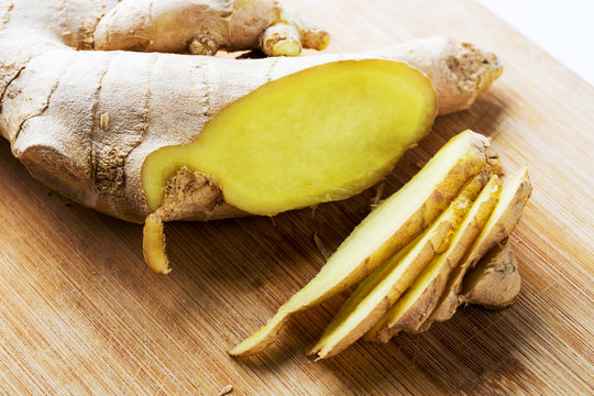 Fresh ginger on chopping board