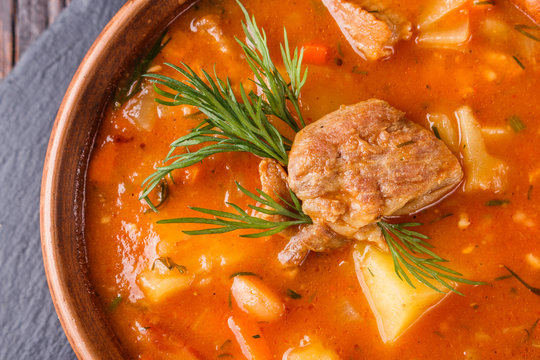 Chanahi a traditional Georgian meat stew in a bowl on stoyn board