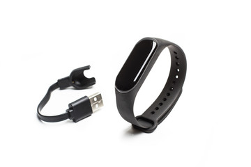 Fototapeta premium Reloj pulsera de fitness deporte sobre fondo blanco aislado. Vista de frente. Copy space