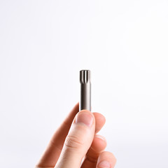  Set of screwdriver bits in the man's hand (torx heads)