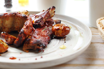  Grilled ribs glazed with marinade barbecue. Main course