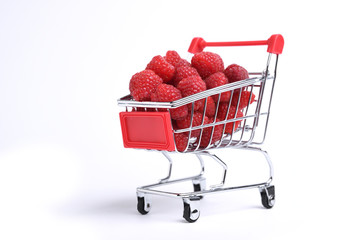  Fruit raspberry in a little metal basket isolated on white. Cart hand