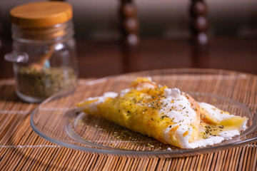 Delicious tapioca from manioc flour with cheese. Brazilian typical food.