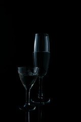 Insulated glass with liquid on black background