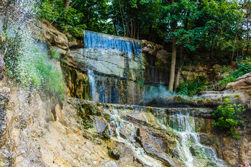 Artificial Waterfall . Decorations in the garden