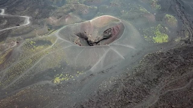 Aerial drone going towards the crater of the Etna vulcano near Catania in Sicily, Italy.
