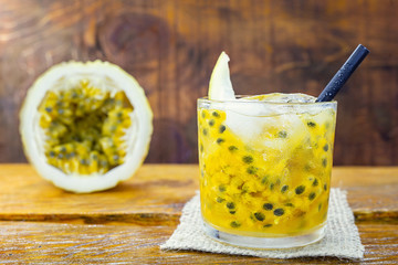 Drink of caipirinha, typical drink from Brazil, made of cachaça and passion fruit. Traditional...