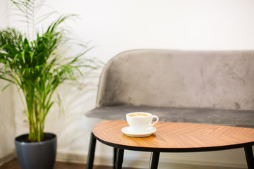 Modern simple cafe interior, table, chairs.
